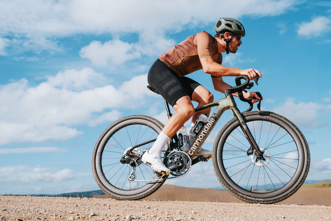 Riding a gravel bike on a dusty track