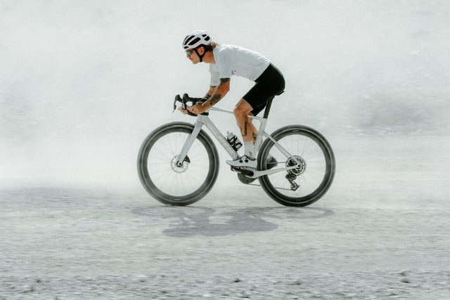 Riding the Edelsten RX through a dust cloud on gravel
